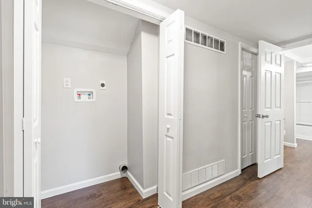 a bathroom with a sink a vanity and a mirror