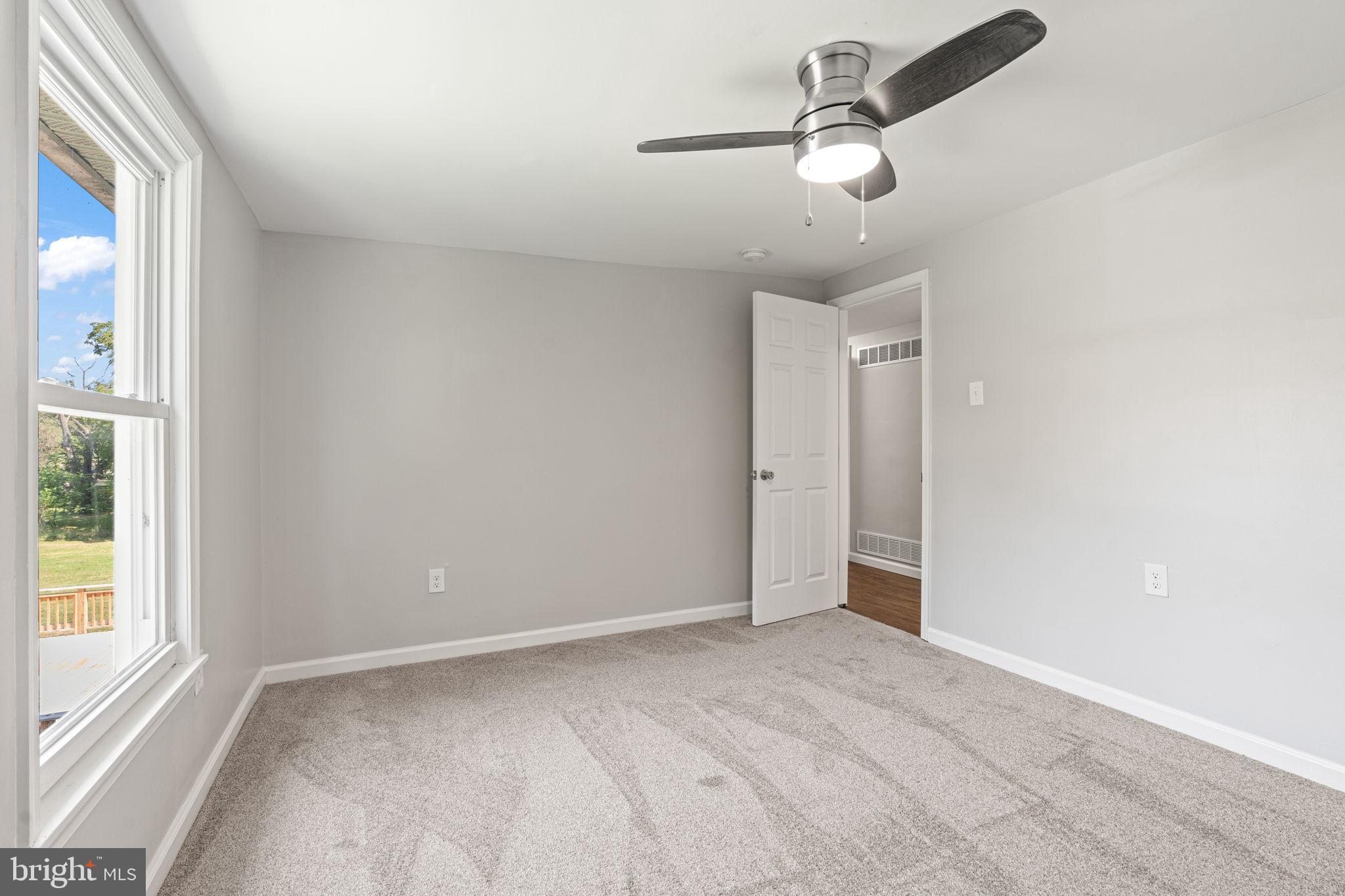 1005 2nd Avenue Manchester, PA 17345 - Photo 46 of 54 an empty room with windows and fan