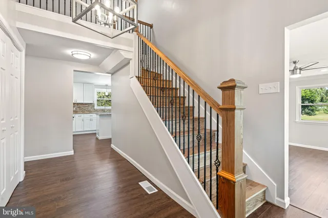 a view of entryway with wooden floor