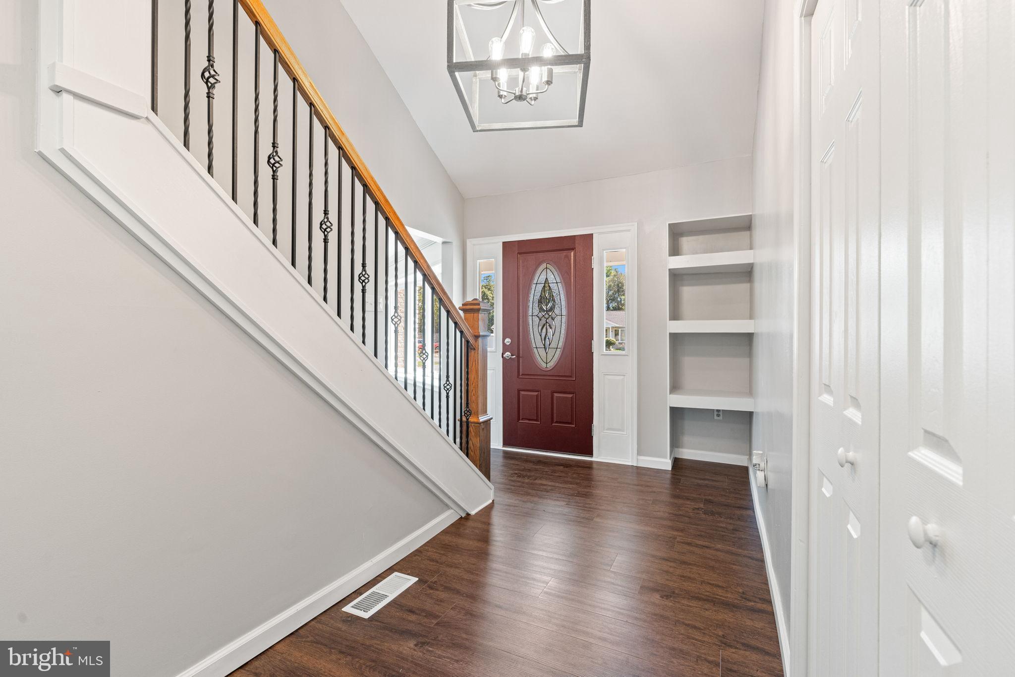 1005 2nd Avenue Manchester, PA 17345 - Photo 8 of 54 a view of a hallway with wooden floor and entryway