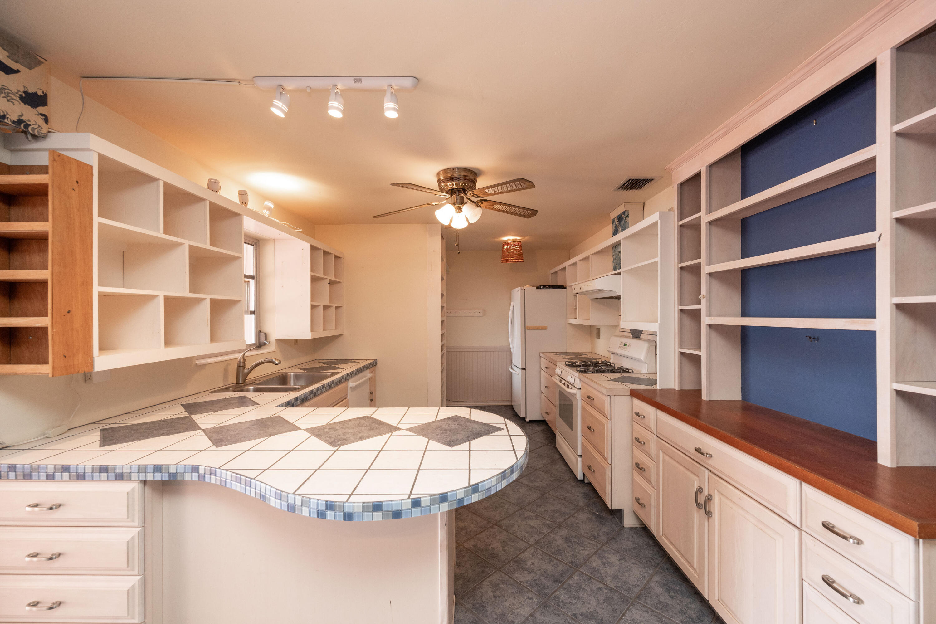 103 Key Haven Road Key Haven, FL 33040 - Photo 20 of 36 a kitchen with a sink and a stove
