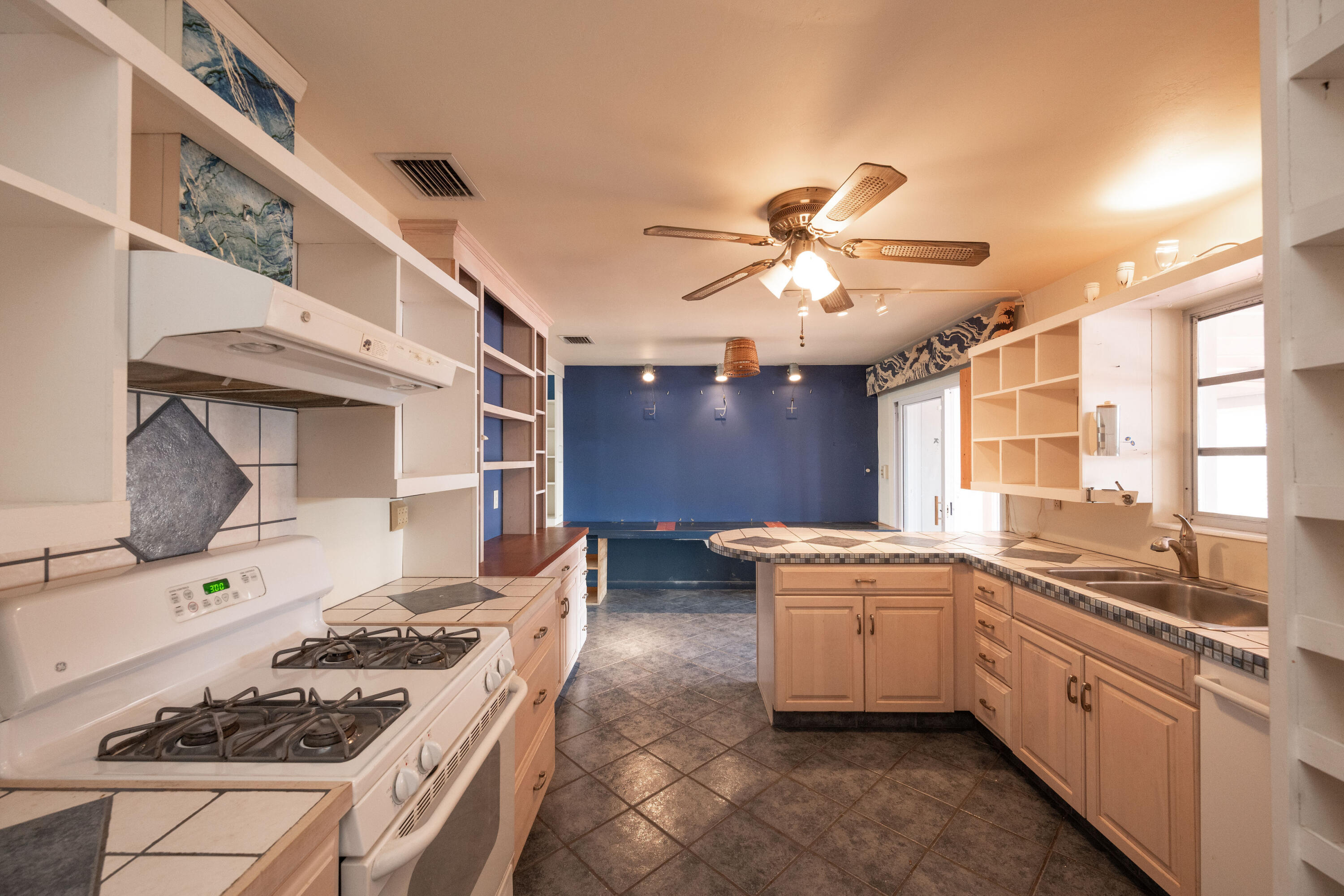 103 Key Haven Road Key Haven, FL 33040 - Photo 22 of 36 a kitchen that has a sink and a stove