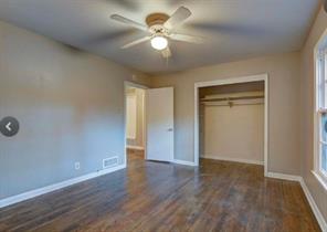 909 Duncan Lane, Unit A Austin, TX 78705 - Photo 12 of 18 a view of an empty room with a window