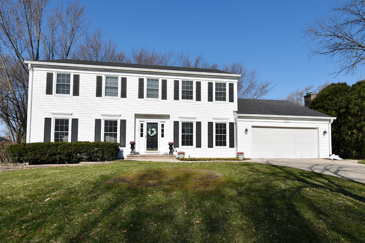 1924 Heather Road Geneva, IL 60134 - Photo 1 of 30 a front view of a house with a yard