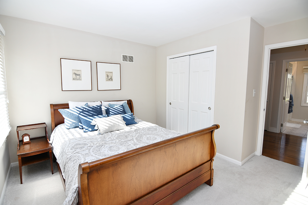 1924 Heather Road Geneva, IL 60134 - Photo 23 of 30 a bedroom with a bed and a cabinets
