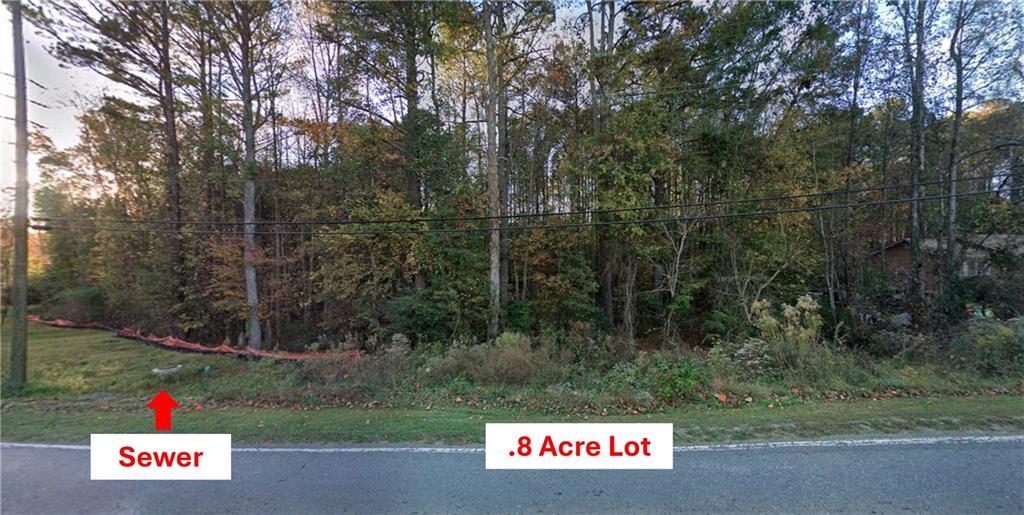 557 Hickory Road Canton, GA 30115 - Photo 10 of 10 a view of a park with large trees
