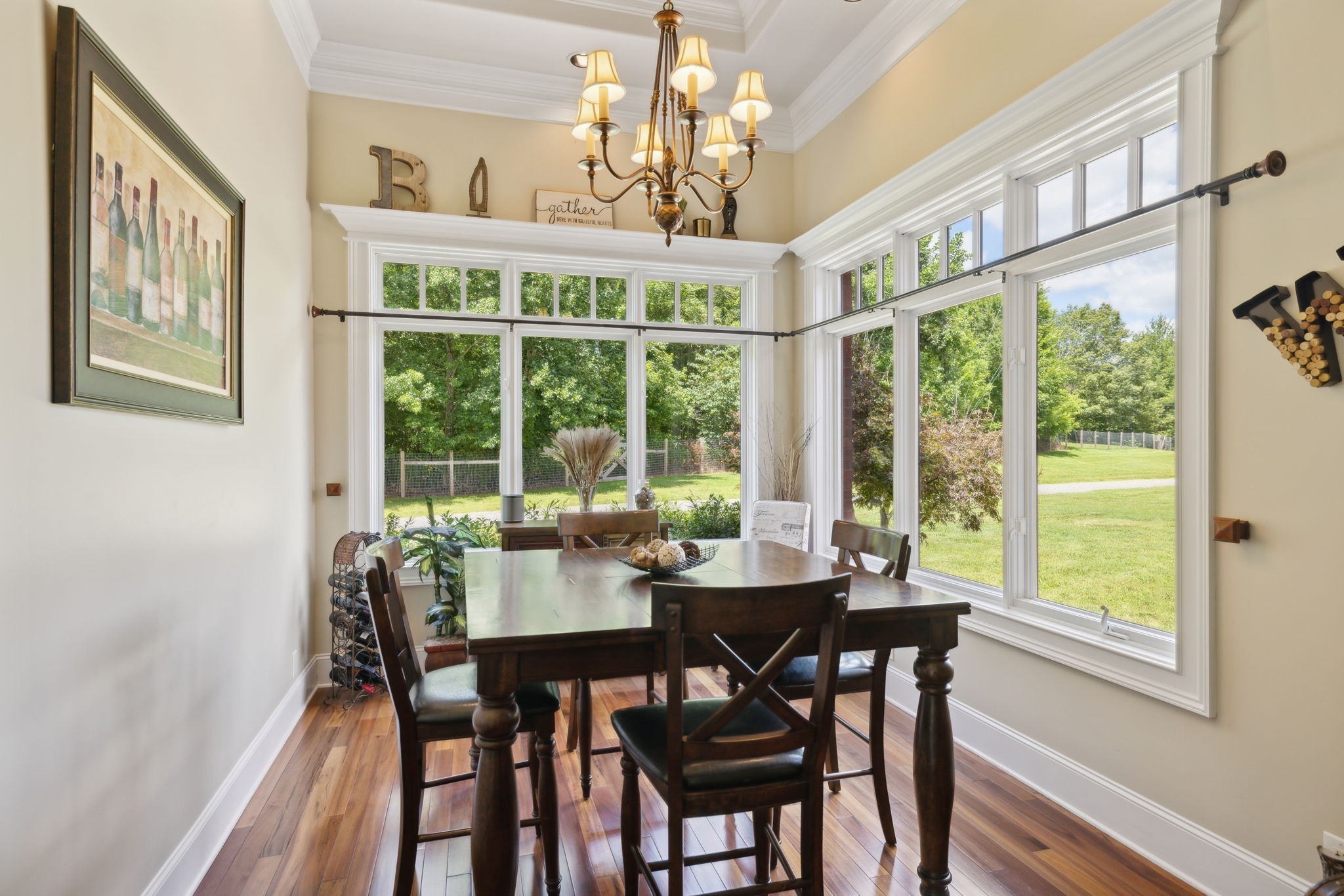 2526 Bearden Road Clarksville, TN 37043 - Photo 13 of 69 a view of a dining room with furniture large windows and wooden floor