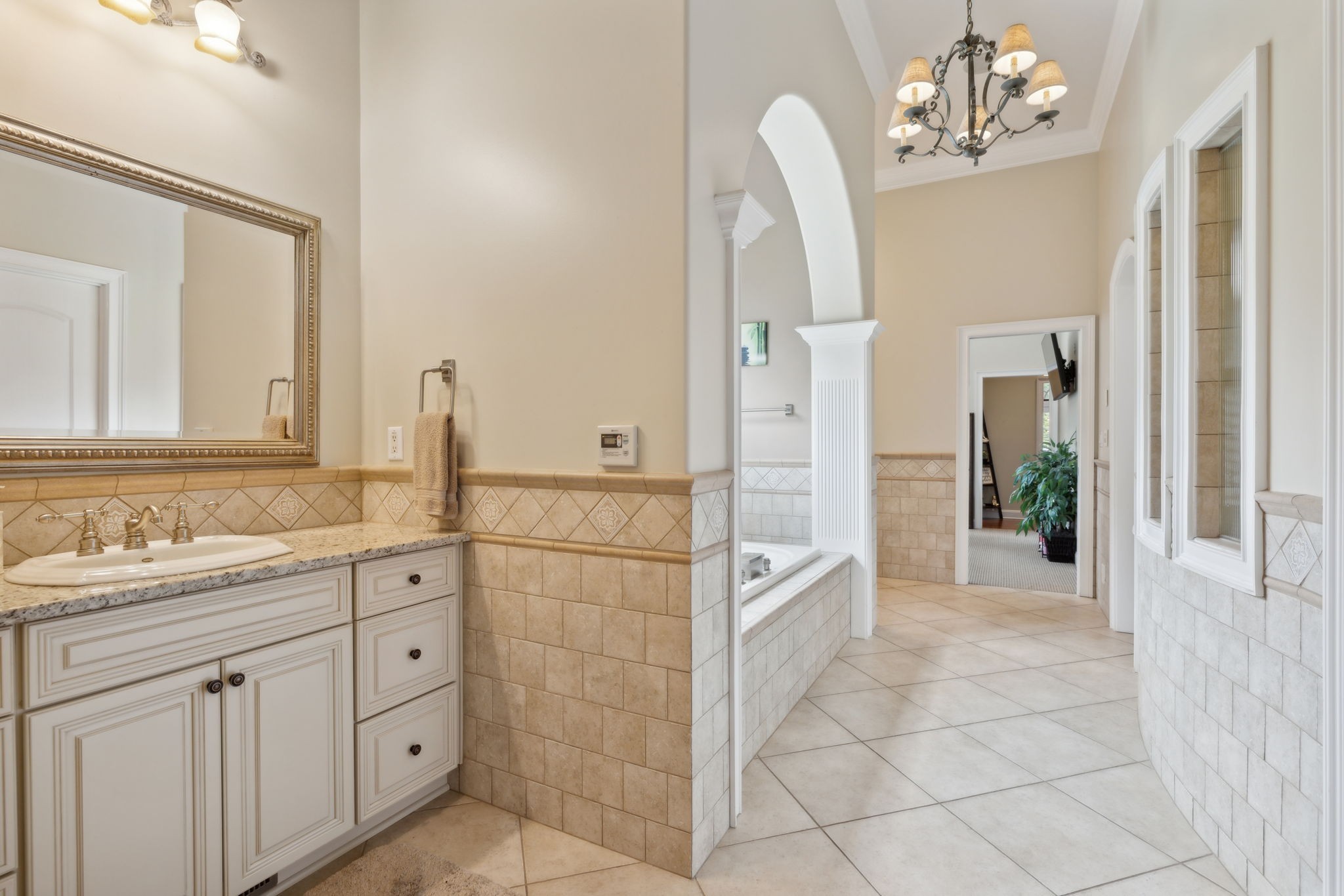 2526 Bearden Road Clarksville, TN 37043 - Photo 25 of 69 a bathroom with a double vanity sink mirror and bathtub