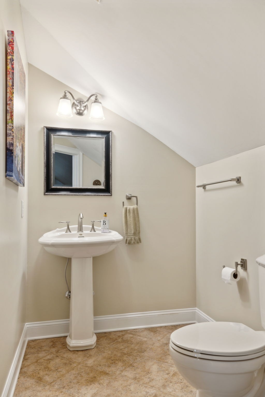 2526 Bearden Road Clarksville, TN 37043 - Photo 35 of 69 a bathroom with a sink a toilet and mirror