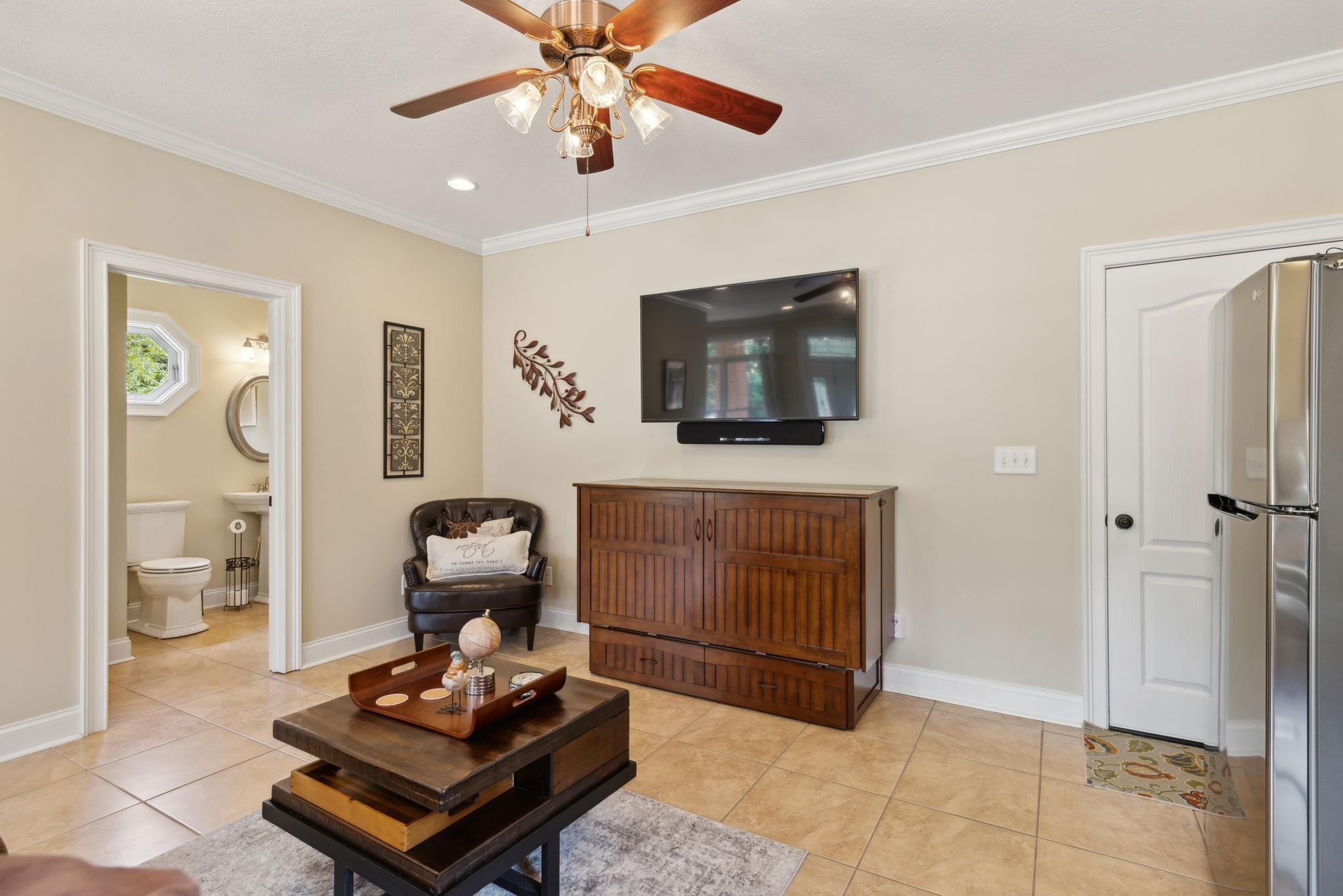 2526 Bearden Road Clarksville, TN 37043 - Photo 52 of 69 a living room with furniture and a flat screen tv