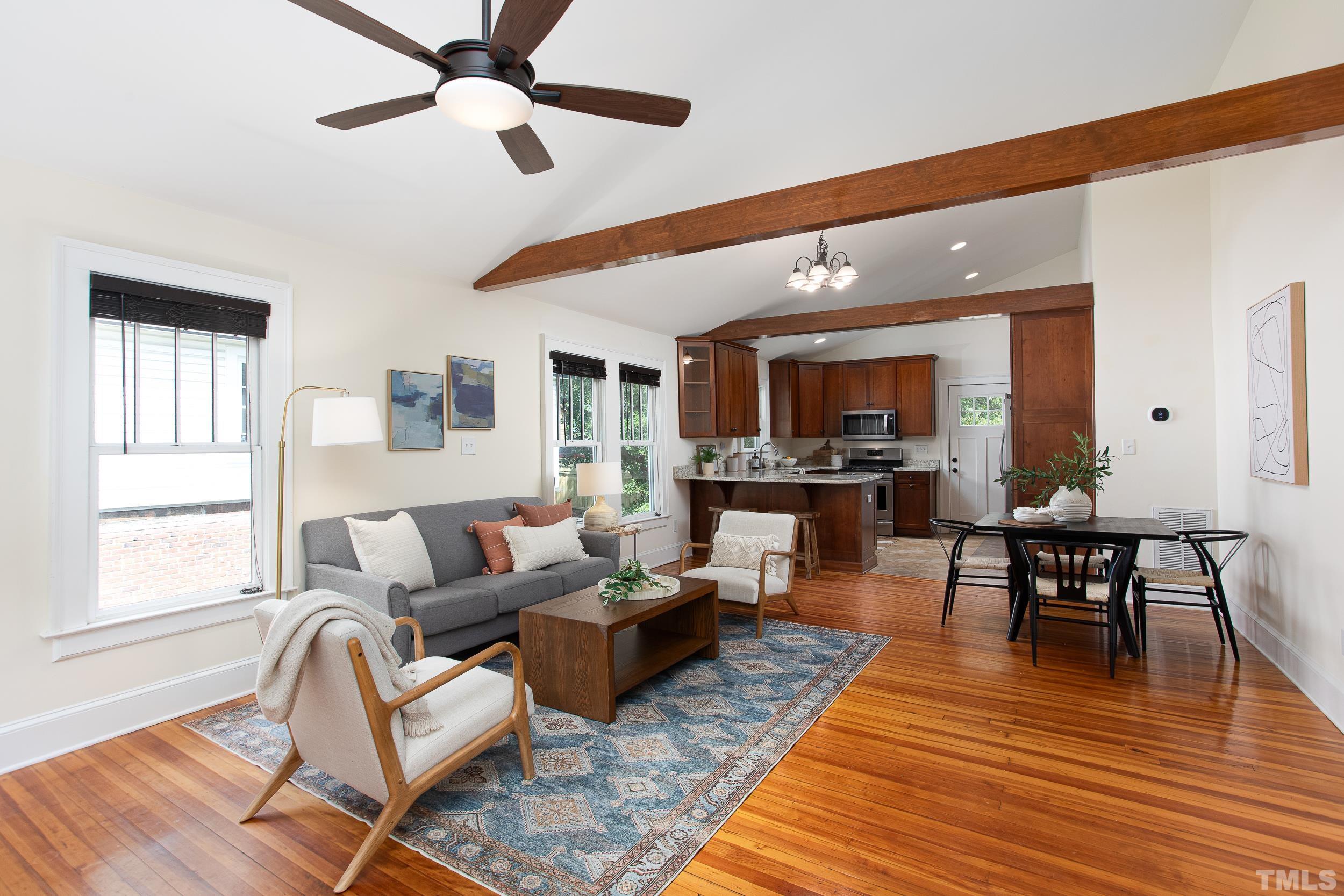 1218 North Roxboro Street Durham, NC 27701 - Photo 3 of 39 a living room with furniture wooden floor and a window