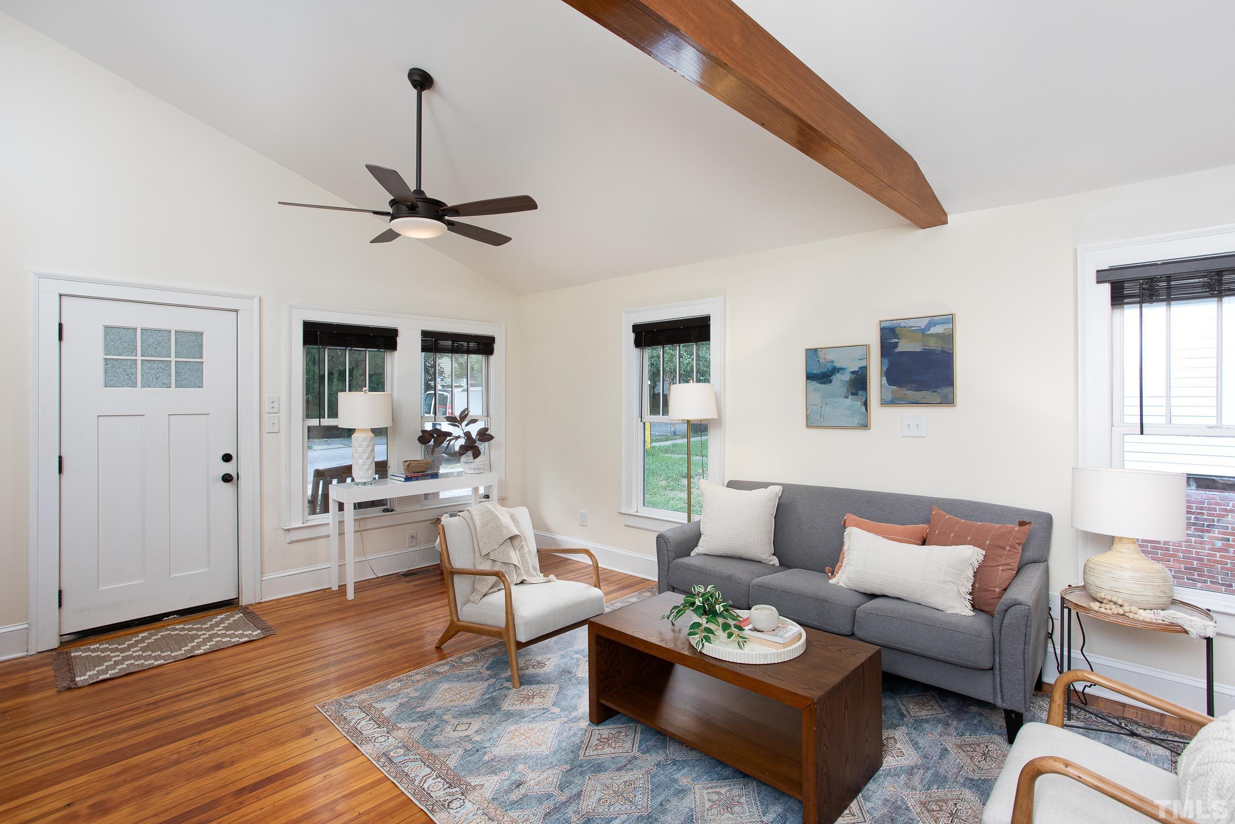 1218 North Roxboro Street Durham, NC 27701 - Photo 7 of 39 a living room with furniture fireplace and a window