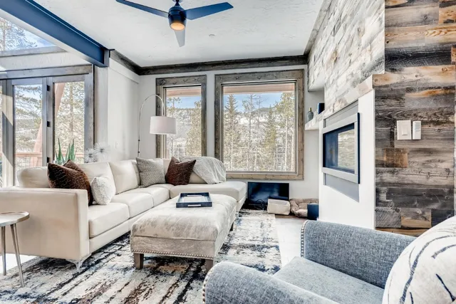 a kitchen with stainless steel appliances granite countertop a sink refrigerator and cabinets