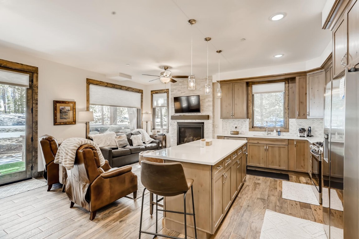 117 Lake Ridge Circle, Unit 1863 Keystone, CO 80435 - Photo 36 of 38 a living room with furniture a dining table and kitchen view