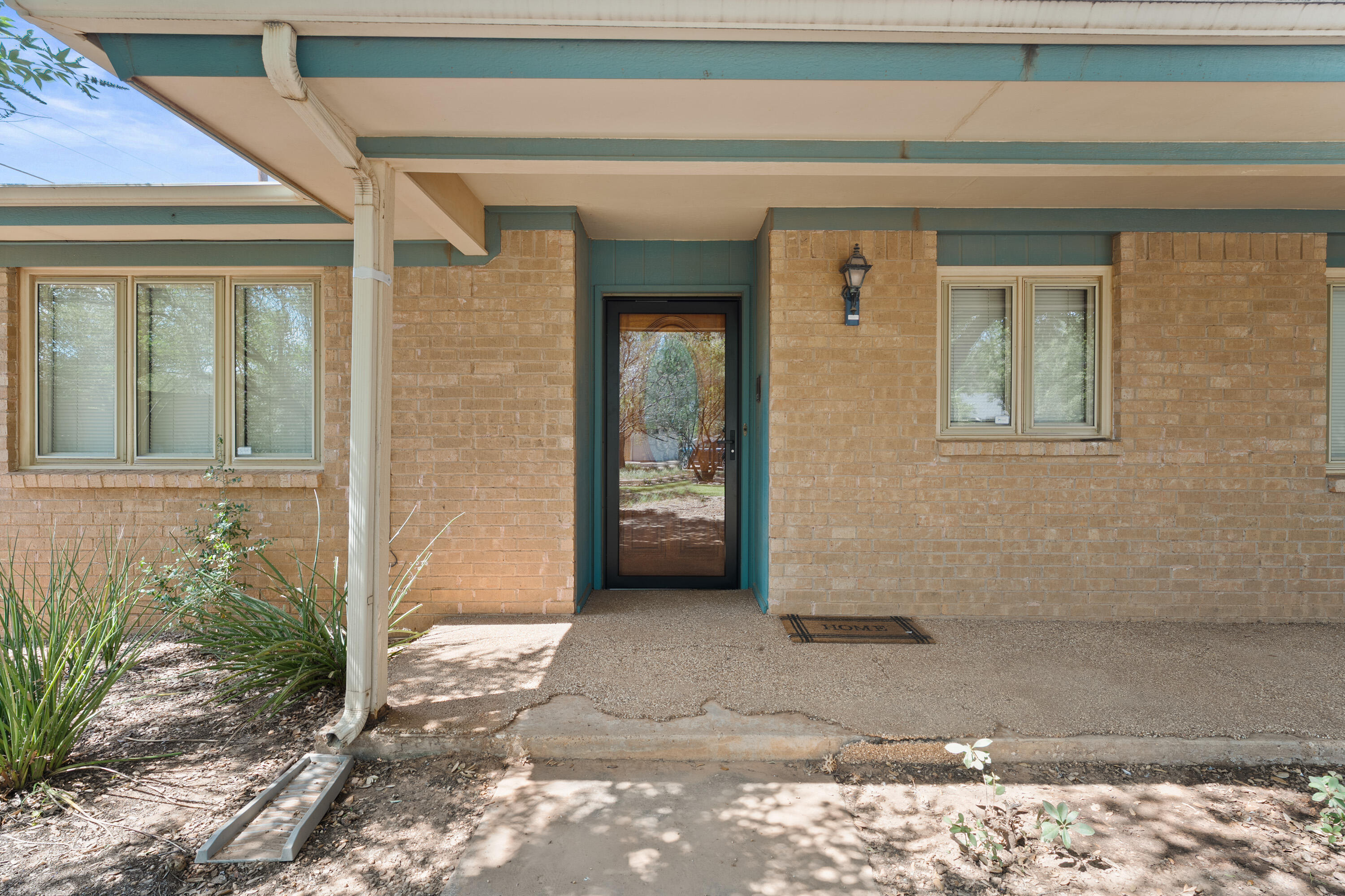 8016 Dover Avenue Lubbock, TX 79424 - Photo 2 of 25 a view of a front door of the house