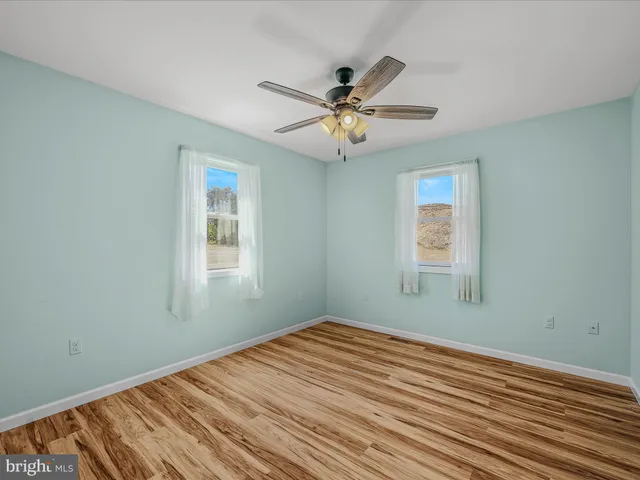 a view of a livingroom with a ceiling fan