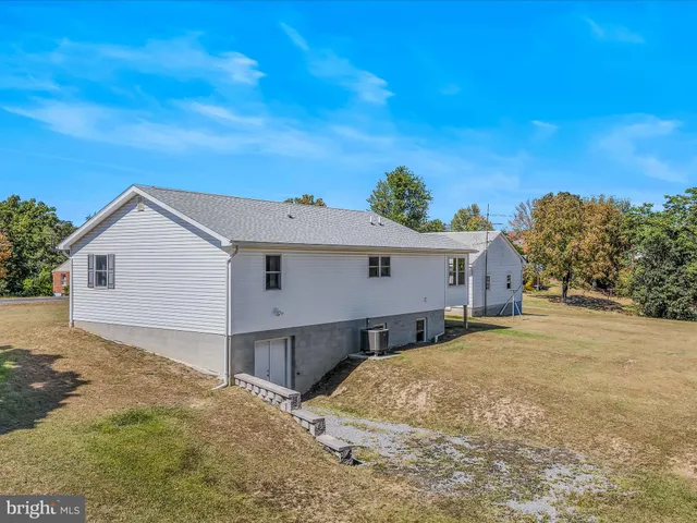 a house view with a outdoor space