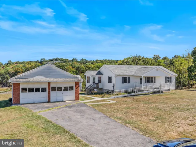 a view of a garage with chairs