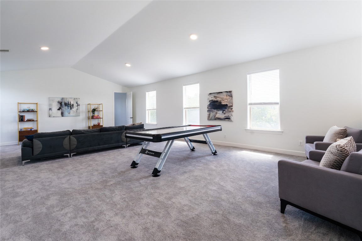 724 Chama Trace Dripping Springs, TX 78620 - Photo 23 of 40 a living room with furniture and a window