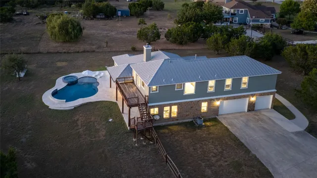 a picture of a bathroom with a shower curtain