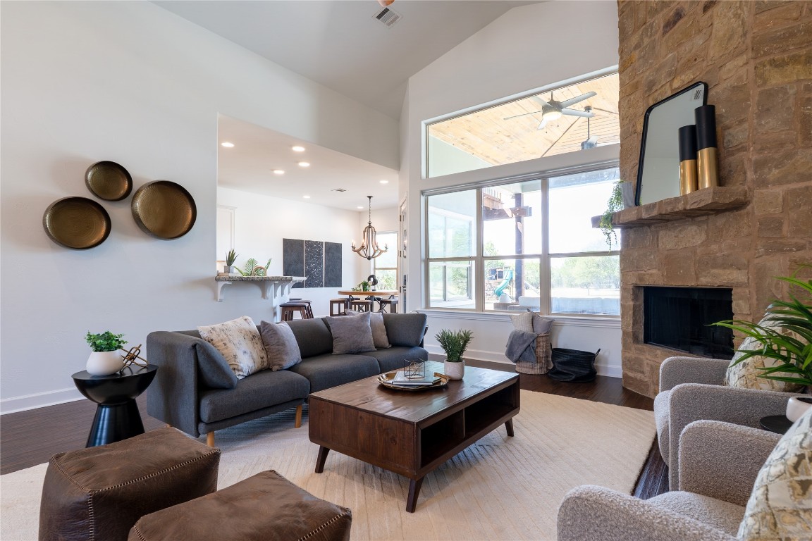 724 Chama Trace Dripping Springs, TX 78620 - Photo 7 of 40 a living room with furniture and a large window