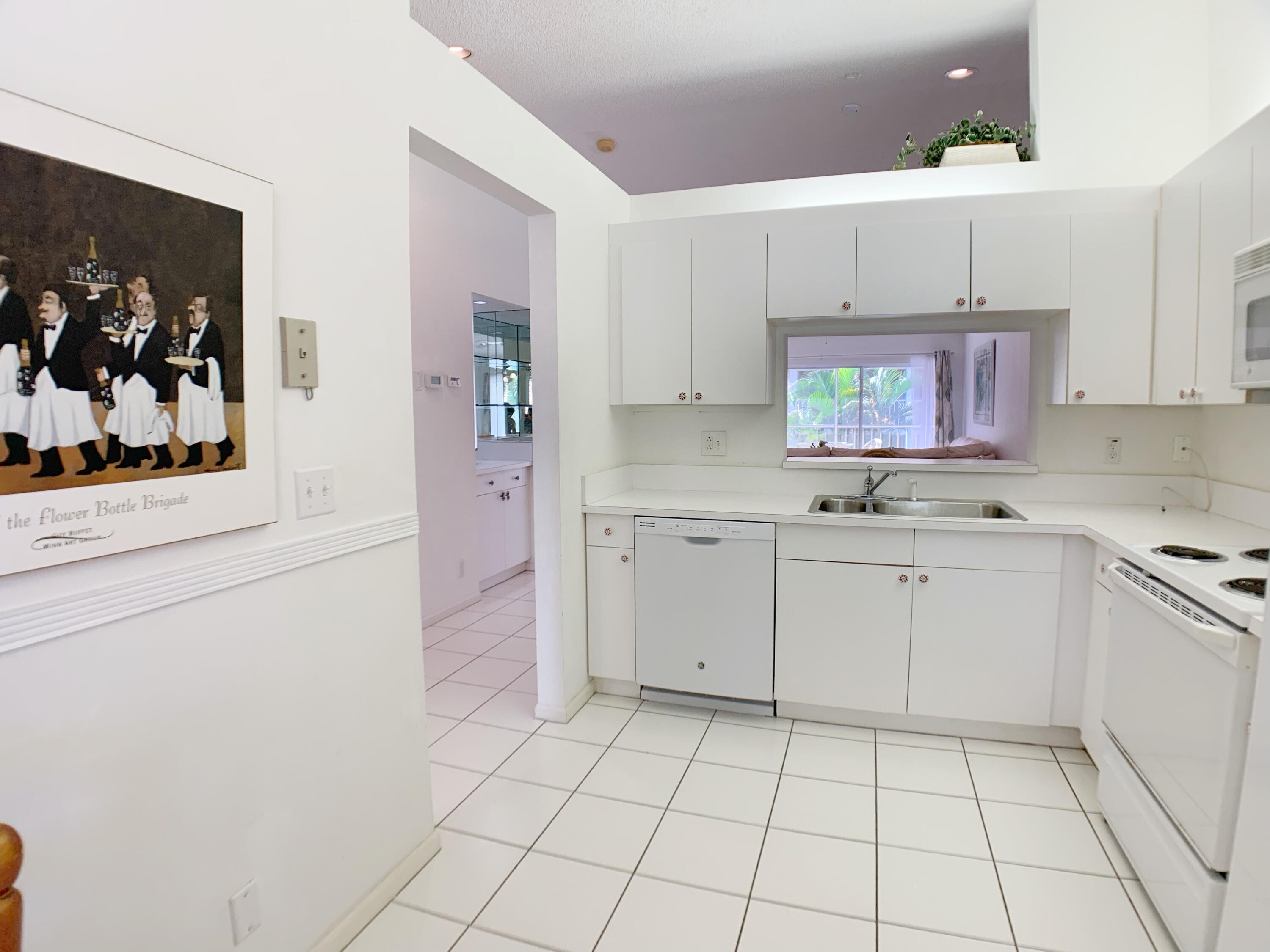 340 Northwest 67th Street, Unit 203 Boca Raton, FL 33487 - Photo 4 of 37 4322FC68-A801-4B20-9AF0-8D927D398925