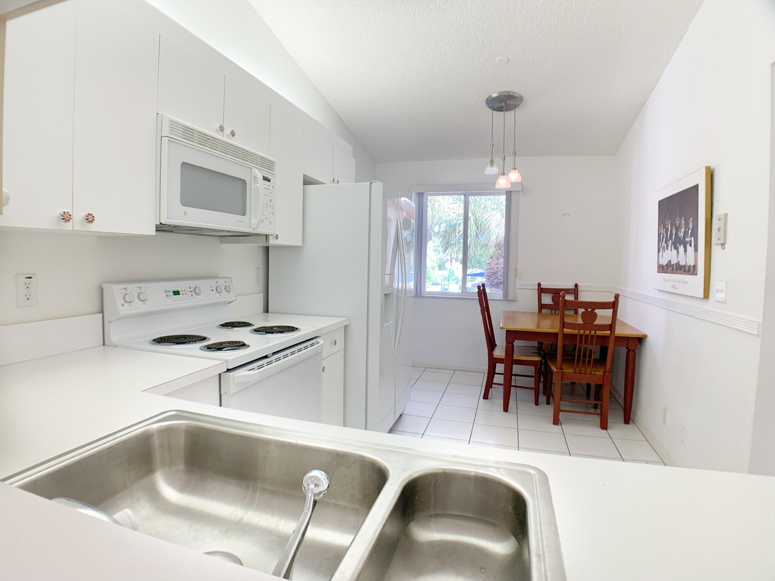340 Northwest 67th Street, Unit 203 Boca Raton, FL 33487 - Photo 6 of 37 99CFFDD0-0B67-4E6E-A3FF-FBD15741340C