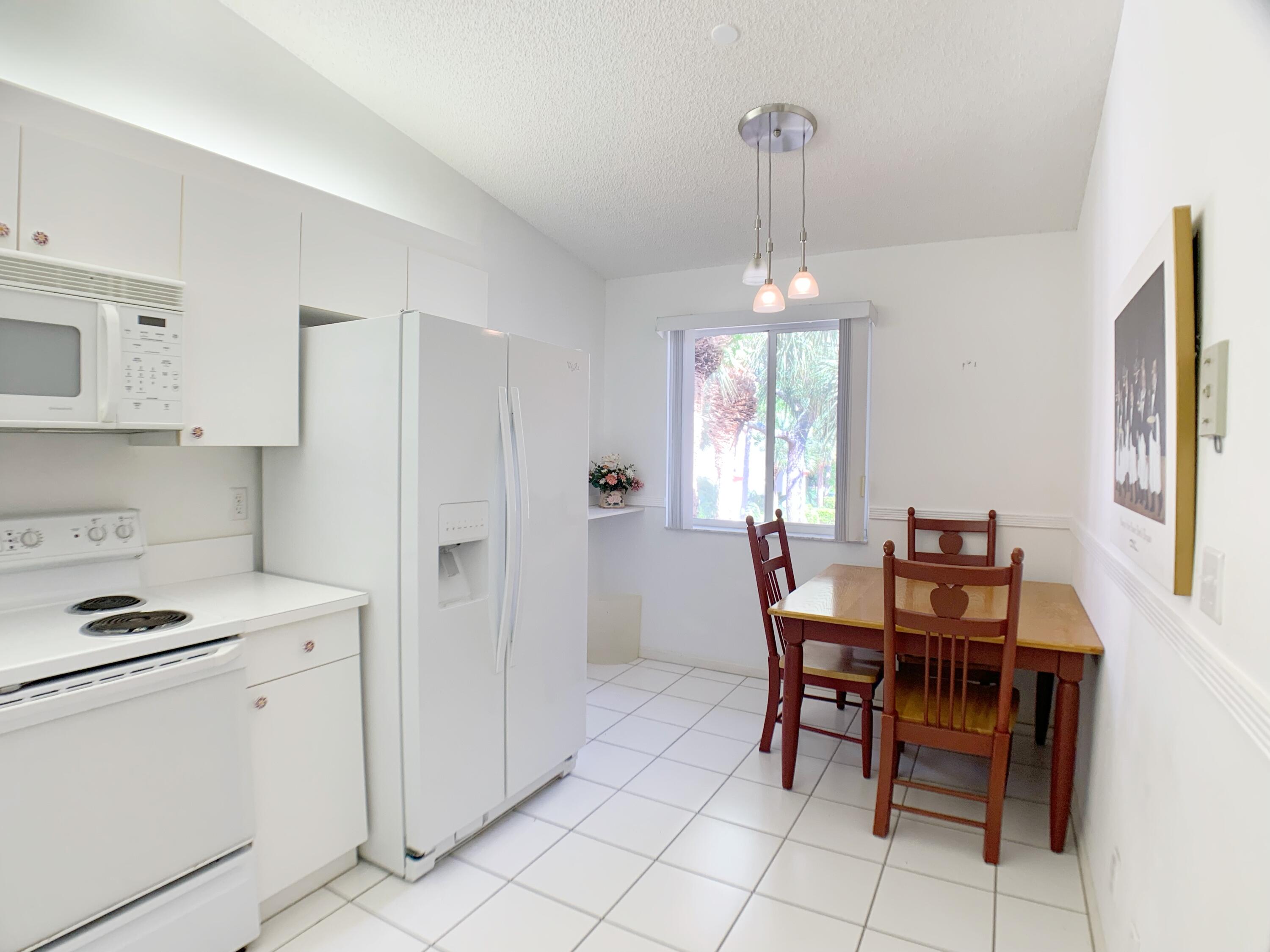 340 Northwest 67th Street, Unit 203 Boca Raton, FL 33487 - Photo 7 of 37 182D0914-D693-49B9-9FD0-7D380AD4350E