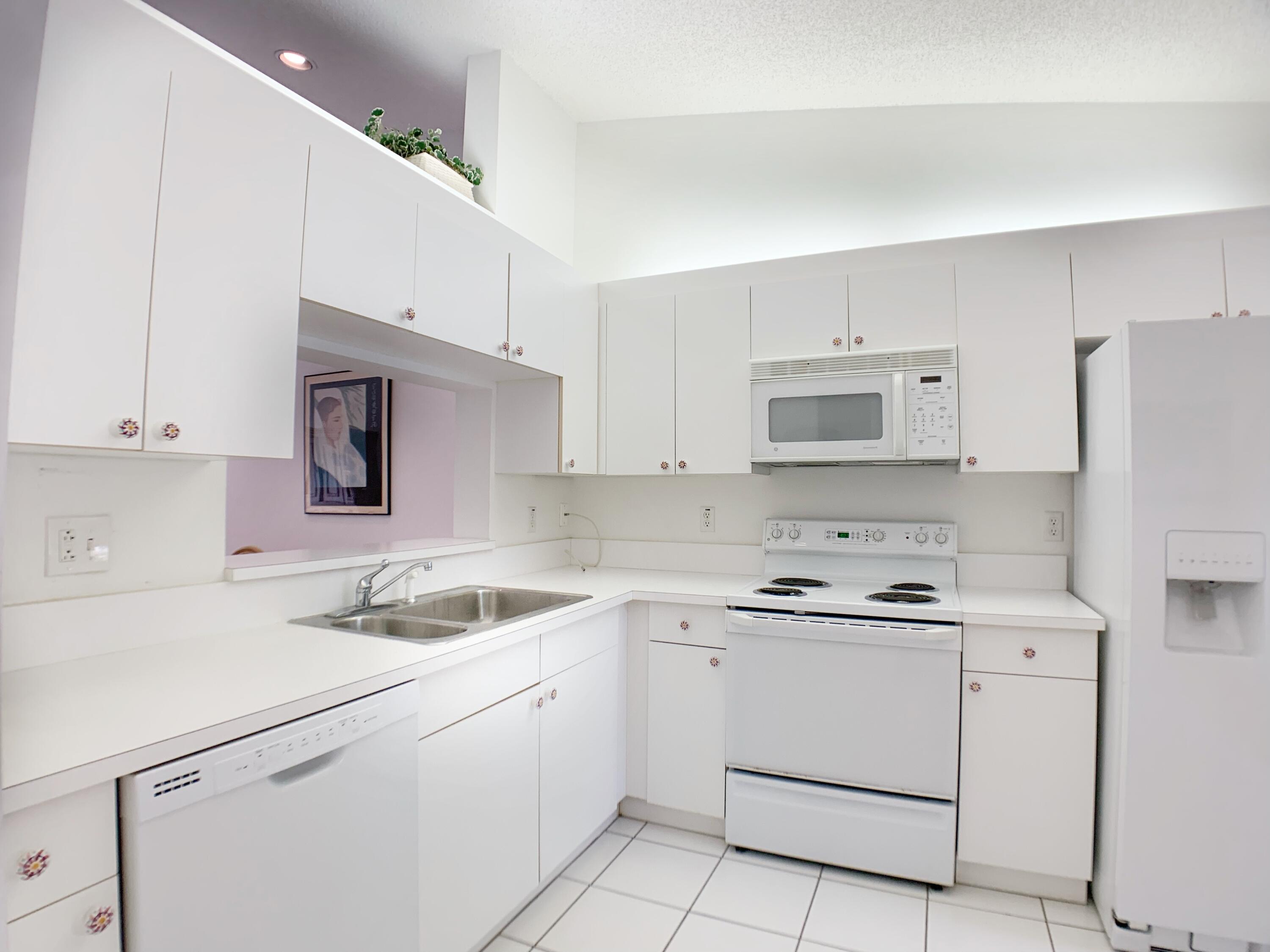 340 Northwest 67th Street, Unit 203 Boca Raton, FL 33487 - Photo 8 of 37 A3EE263E-9433-49BB-AFB1-DFC1C6B7614C
