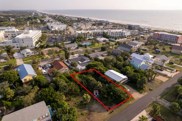 an aerial view of city and lake
