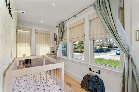 a kitchen with a large window and sink