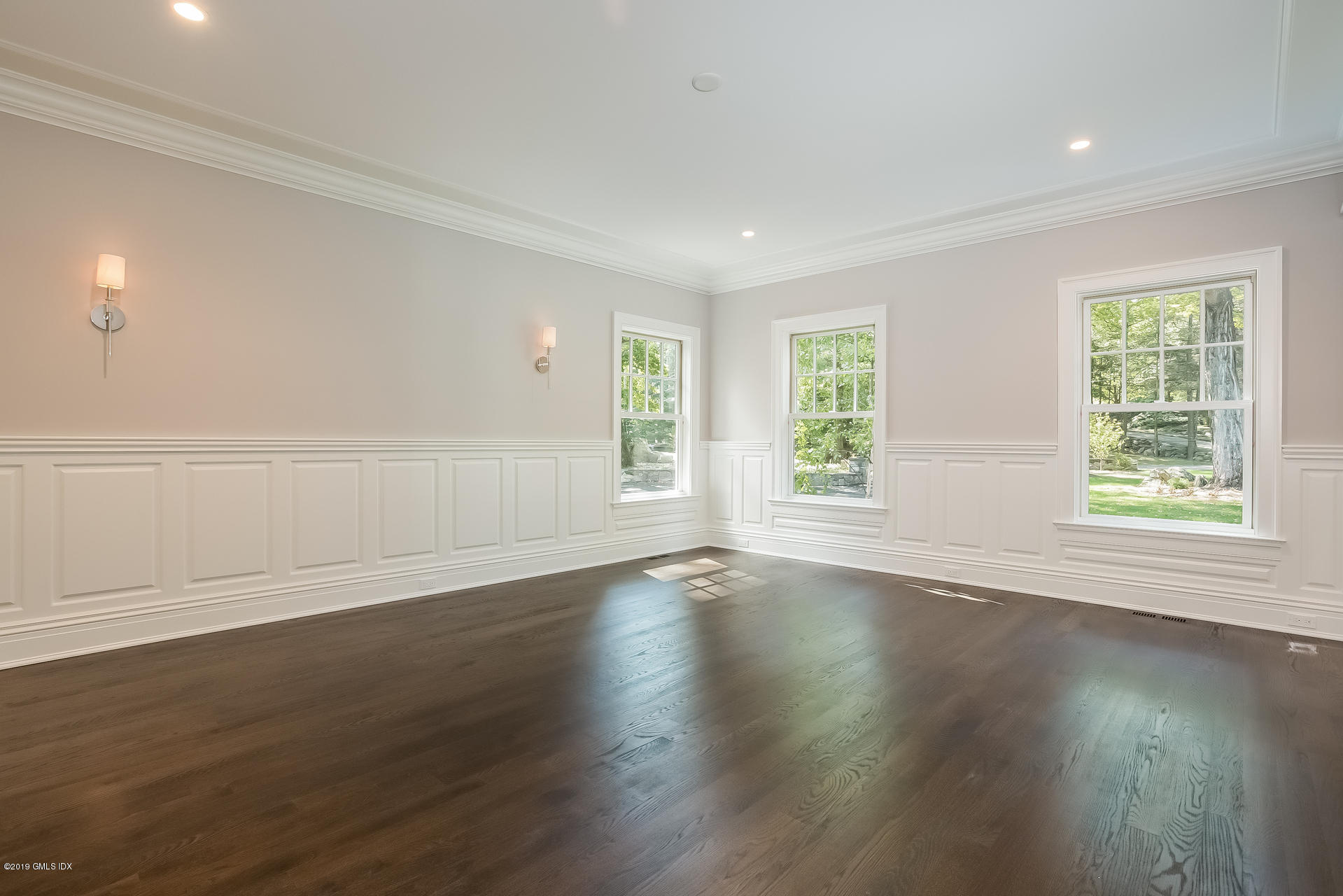 15 Cottontail Road Cos Cob, CT 06807 - Photo 4 of 13 a view of an empty room with wooden floor and a window