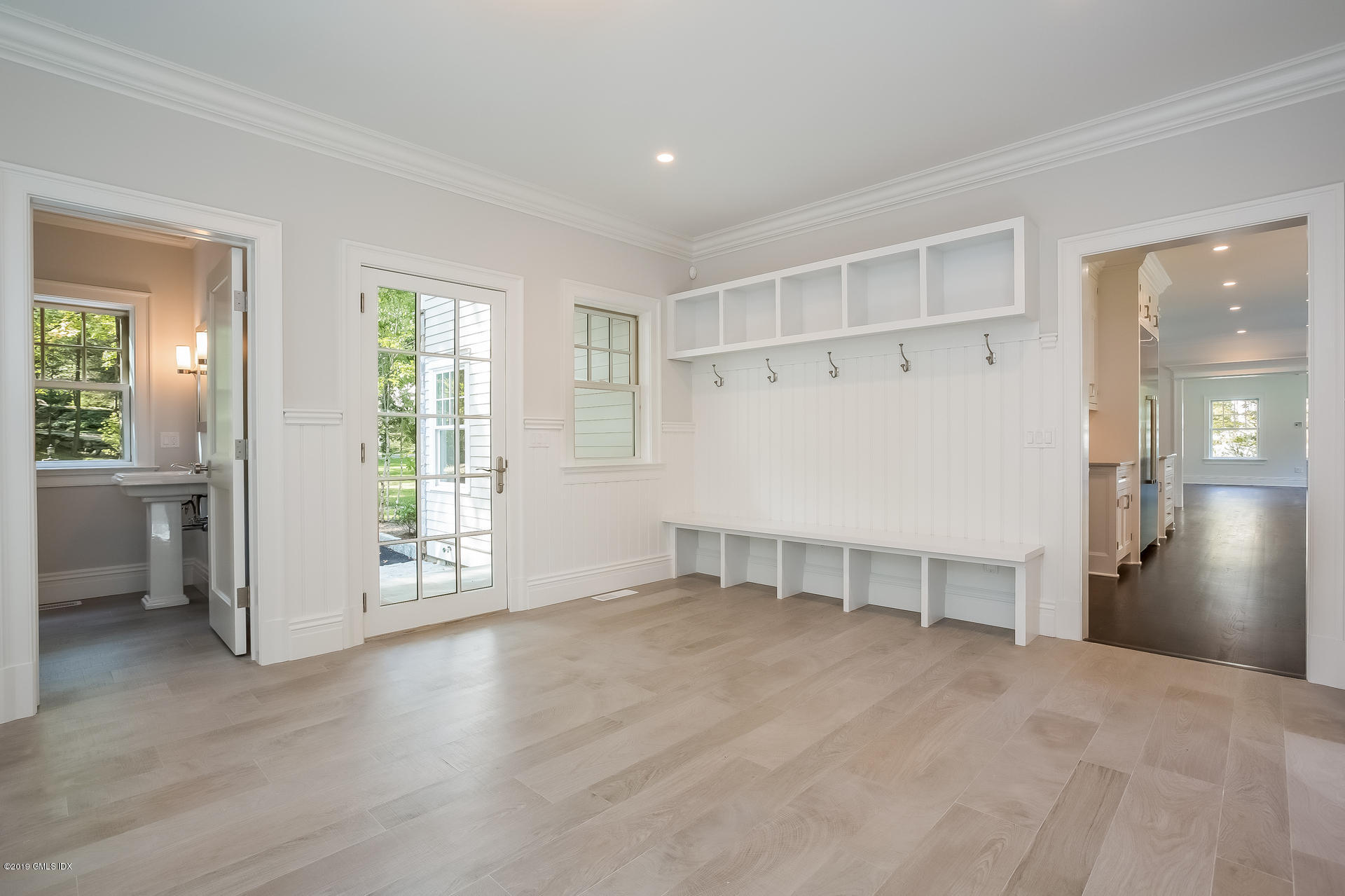 15 Cottontail Road Cos Cob, CT 06807 - Photo 8 of 13 a view of an empty room with a window and wooden floor