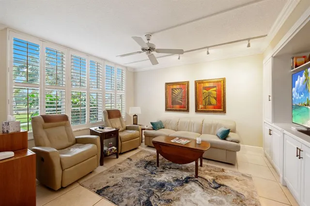 $339,900 | 3970 Oaks Clubhouse Drive, Unit 203, Pompano Beach, FL 33069