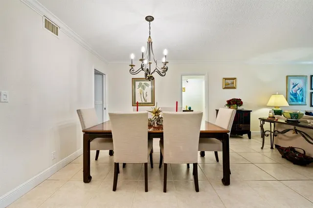 $339,900 | 3970 Oaks Clubhouse Drive, Unit 203, Pompano Beach, FL 33069