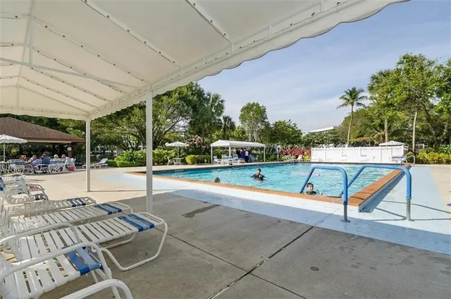 $339,900 | 3970 Oaks Clubhouse Drive, Unit 203, Pompano Beach, FL 33069