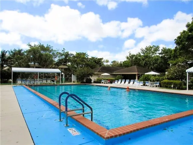 $339,900 | 3970 Oaks Clubhouse Drive, Unit 203, Pompano Beach, FL 33069