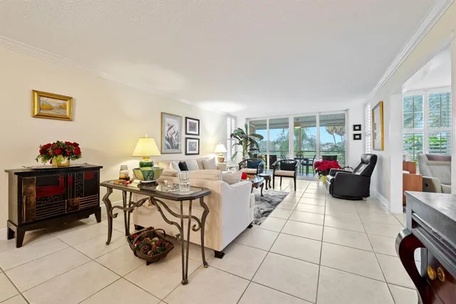 $339,900 | 3970 Oaks Clubhouse Drive, Unit 203, Pompano Beach, FL 33069