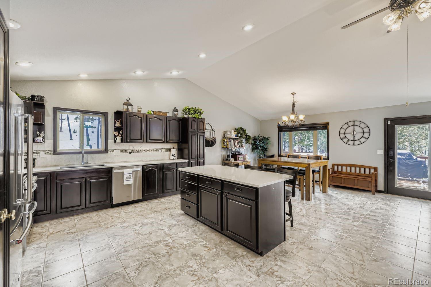 296 Desperado Road Bailey, CO 80421 - Photo 14 of 38 a kitchen with lots of counter top space