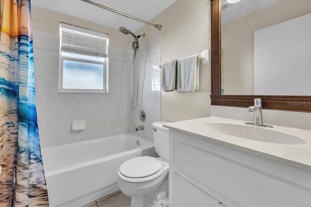 25313 Durango Court Punta Gorda, FL 33955 - Photo 19 of 34 a bathroom with a sink toilet and shower