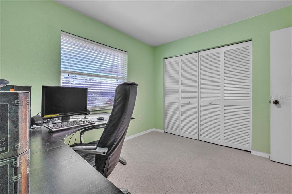 25313 Durango Court Punta Gorda, FL 33955 - Photo 21 of 34 a view of a workspace with furniture and a window