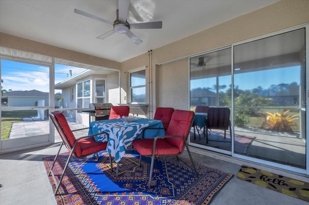 25313 Durango Court Punta Gorda, FL 33955 - Photo 22 of 34 a view of a dining room with furniture window and wooden floor