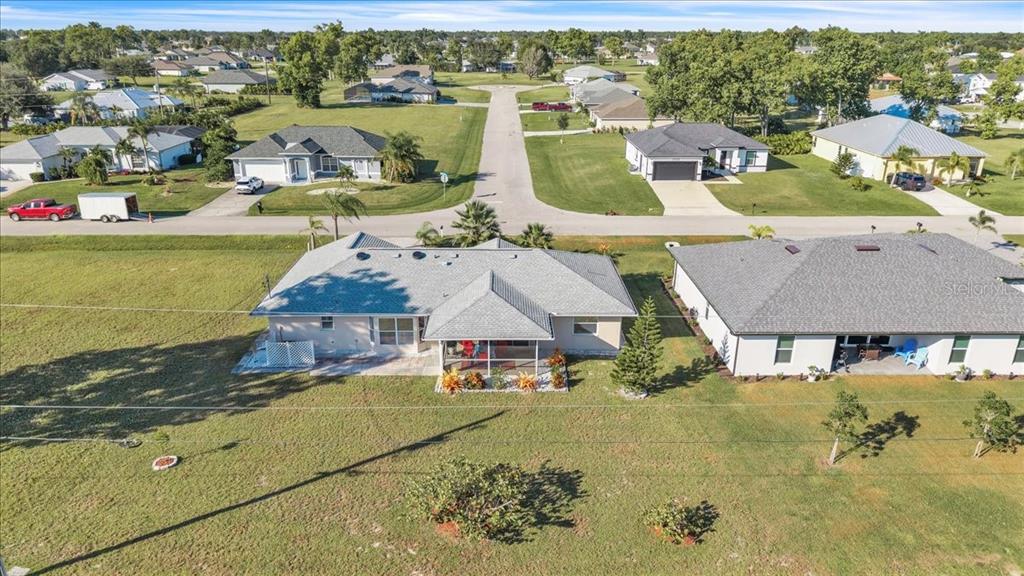 25313 Durango Court Punta Gorda, FL 33955 - Photo 29 of 34 an aerial view of a house with a garden
