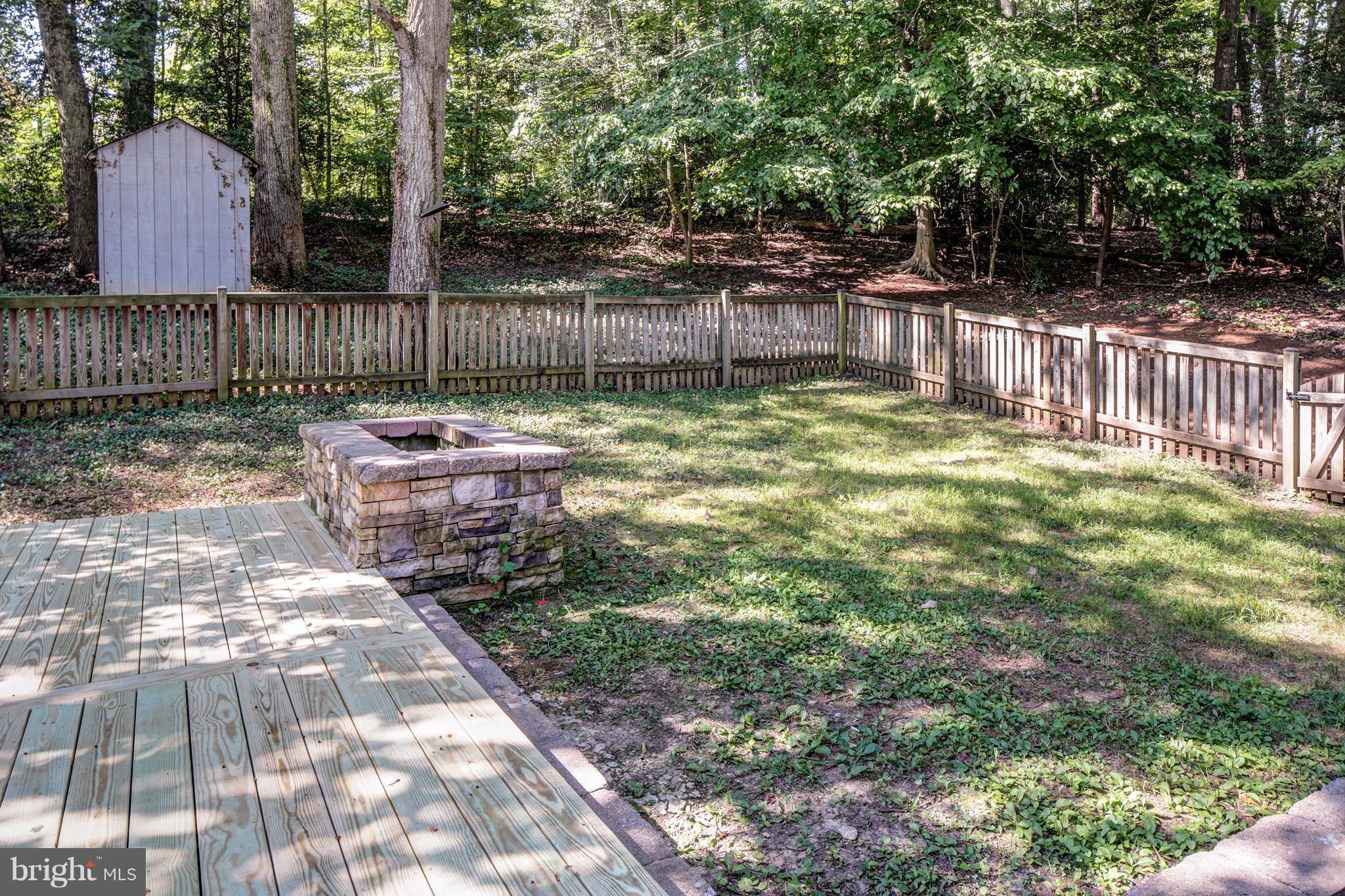 502 Hoot Owl Road Riva, MD 21140 - Photo 11 of 30 a view of backyard with two chairs and table