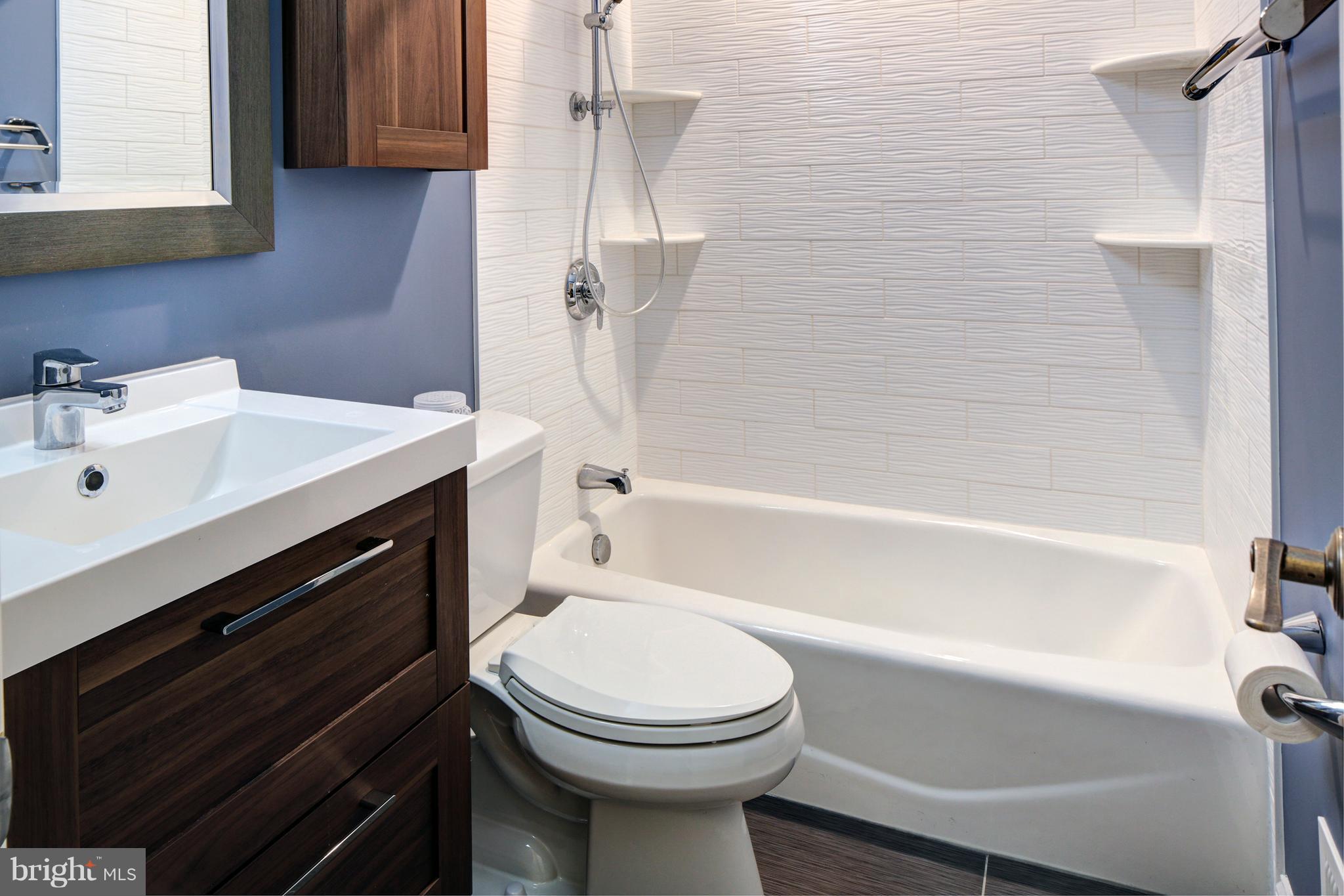 502 Hoot Owl Road Riva, MD 21140 - Photo 12 of 30 a bathroom with a sink a toilet and shower