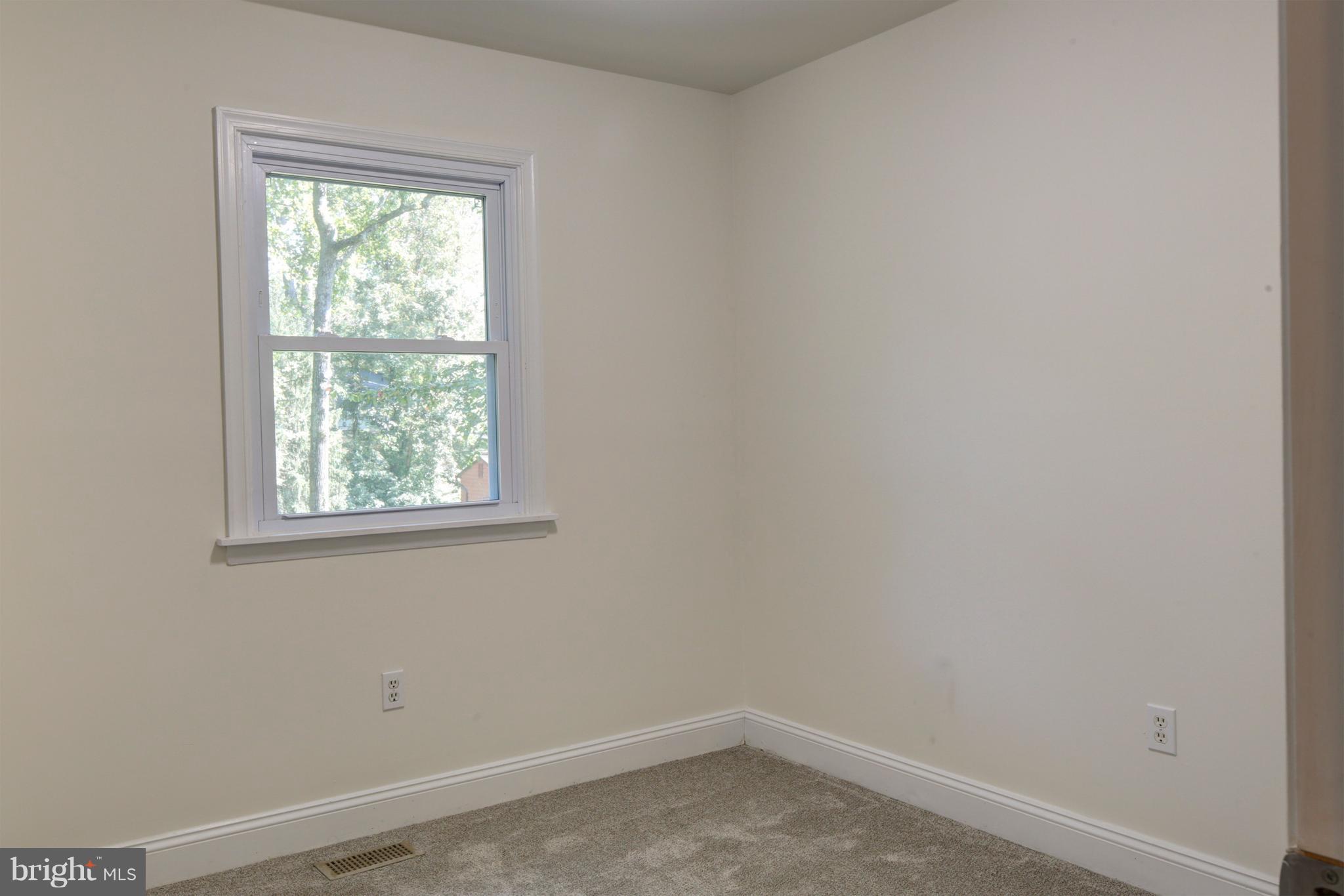 502 Hoot Owl Road Riva, MD 21140 - Photo 17 of 30 an empty room with a window