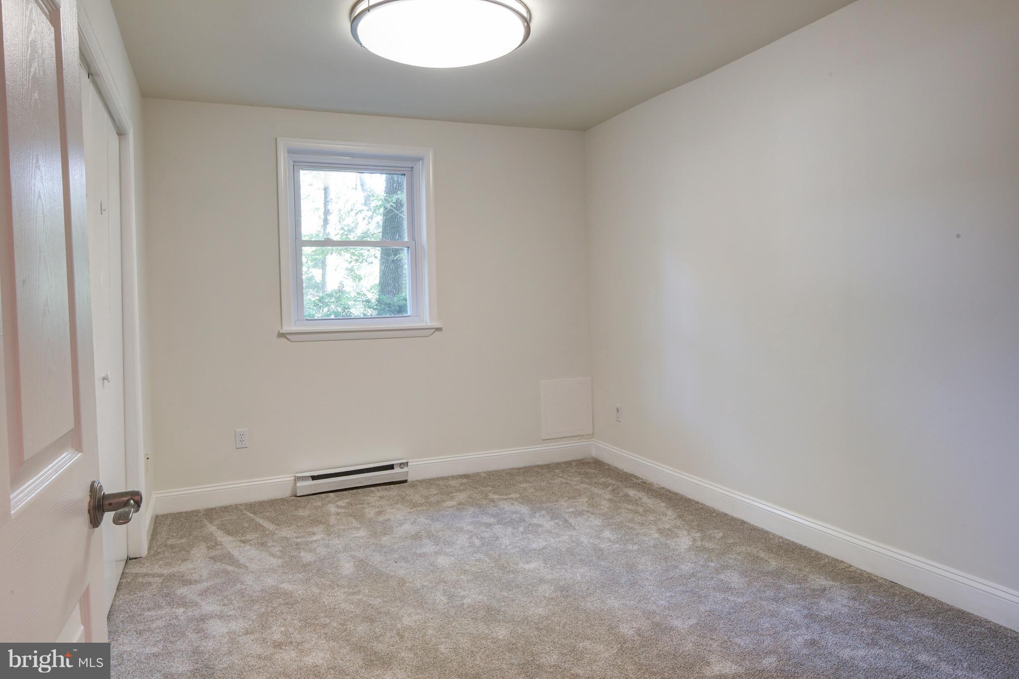 502 Hoot Owl Road Riva, MD 21140 - Photo 21 of 30 an empty room with a window