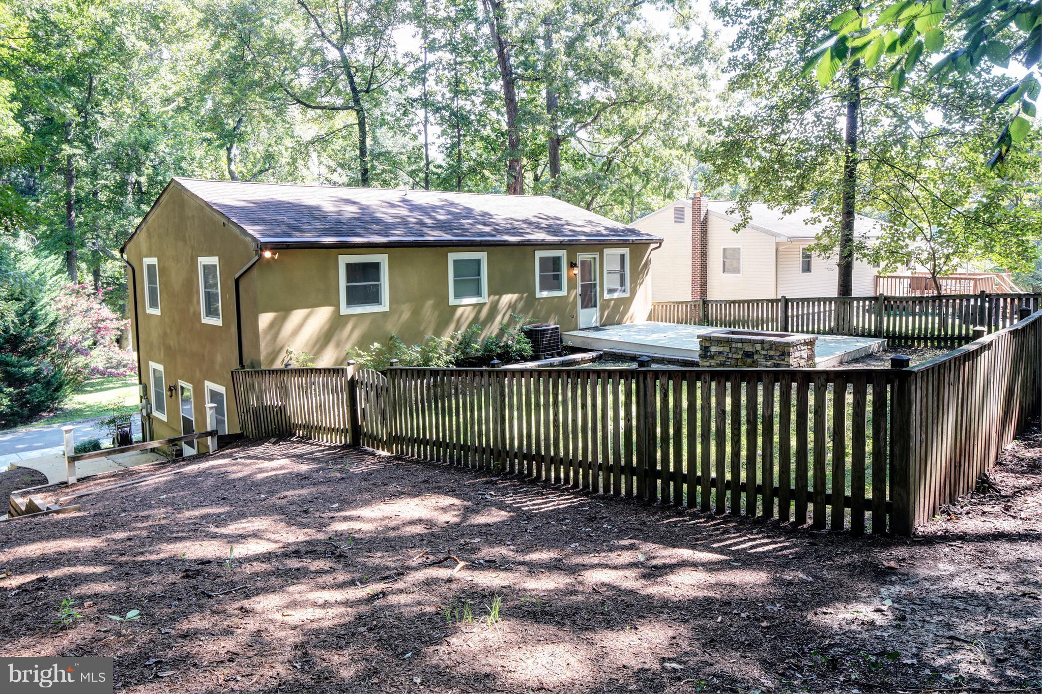 502 Hoot Owl Road Riva, MD 21140 - Photo 24 of 30 a front view of a house with a garden