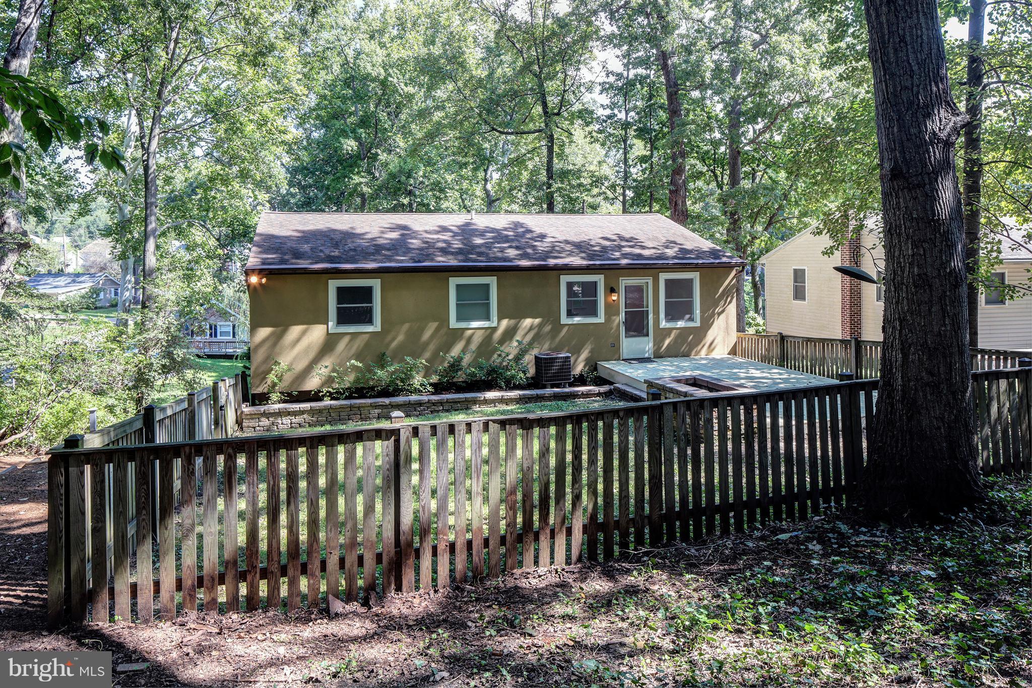 502 Hoot Owl Road Riva, MD 21140 - Photo 25 of 30 a front view of a house with a garden