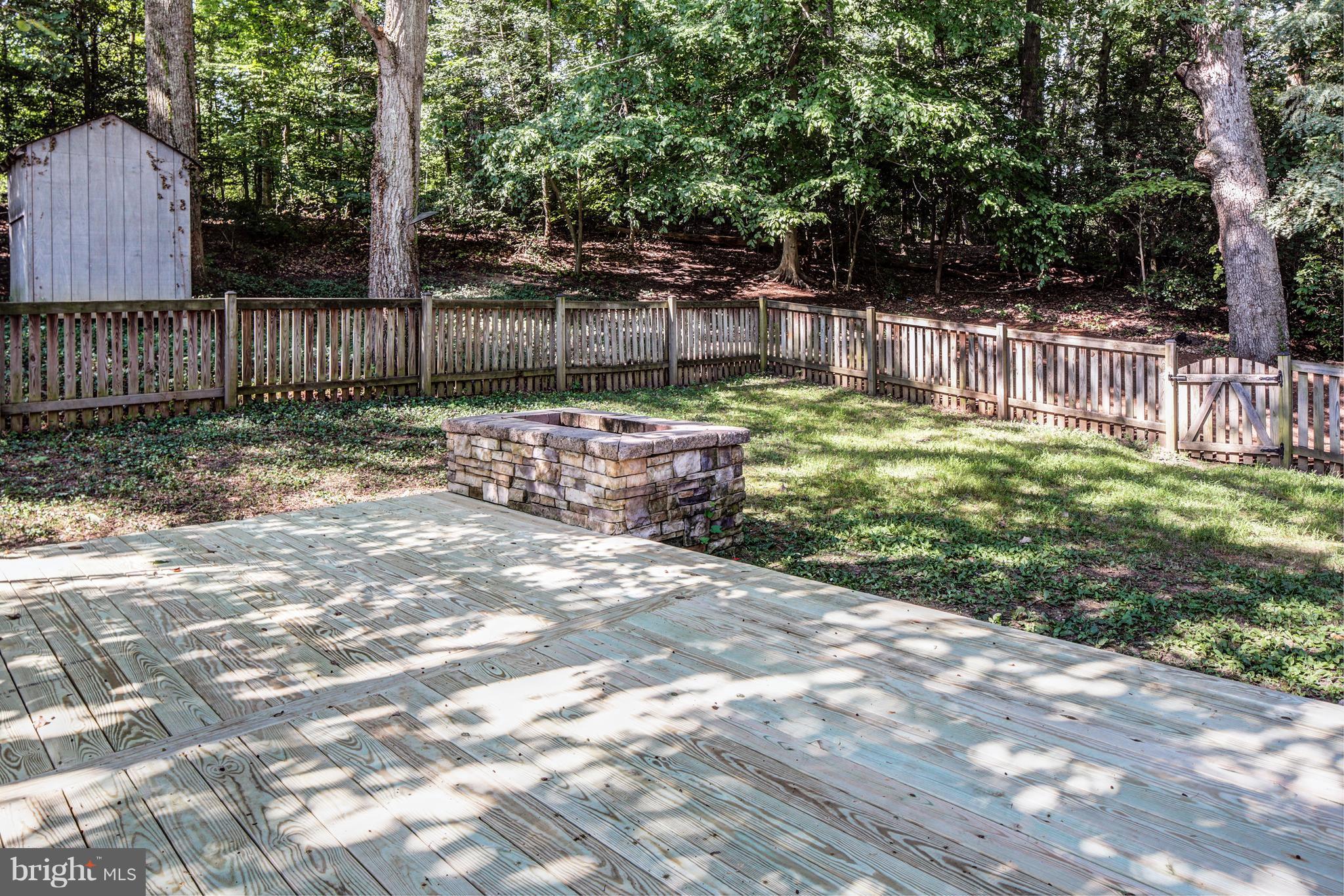 502 Hoot Owl Road Riva, MD 21140 - Photo 10 of 30 a view of a backyard with plants and tree